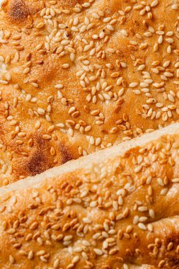 Susamlı çöreğin dokusu makro yakın çekim.