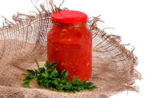 Russian adjika delicious sauce on a white background — Stock Photo, Image