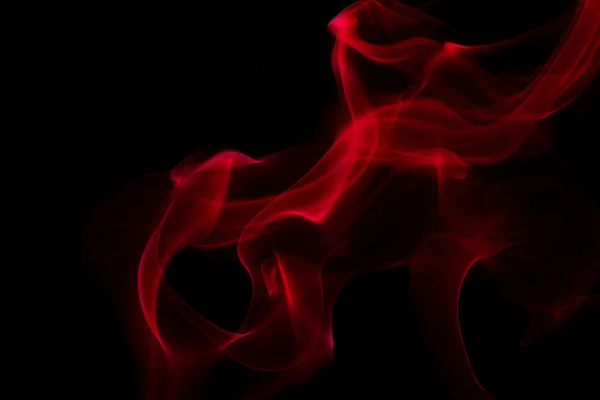 Κόκκινος καπνός σε μαύρο φόντο Royalty Free Εικόνες Αρχείου