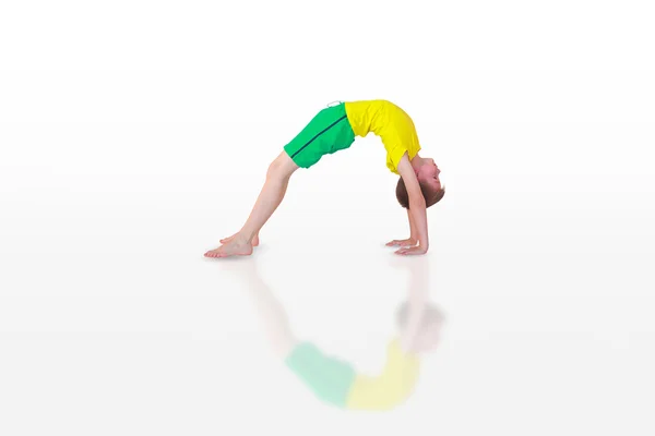 Dhanurasana yoga kid — Stockfoto