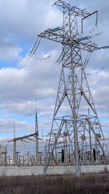 inspection of tower framework details, close examination of transmission tower metal framework