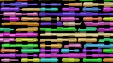 Renkli plastik pipetler kalıplara göre dizilmiş