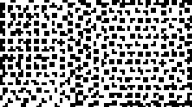 Yüzey boyunca rastgele dizilmiş çeşitli boyutlardaki siyah ve beyaz desenler