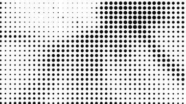 Bir sürü küçük dairenin siyah beyaz fotoğrafı ızgara deseninde sıralanmış.