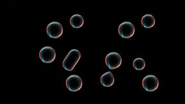 Siyah arkaplanda yüzen renkli kabarcıklar