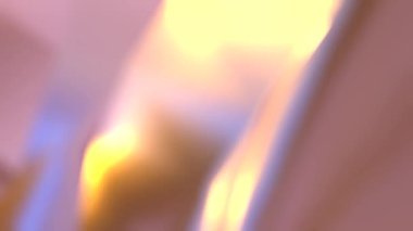 Sürekli hareket halindeki renkli elementleri içeren yüksek karşıtlık bulanık arkaplan.