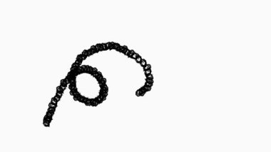 Siyah kıvrımlı tel spiral şeklinde bükülmüş