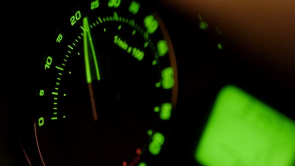 Movement of green car tachometer arrow — Stock Video