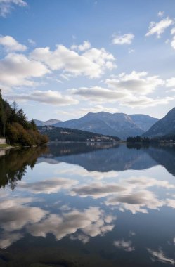 lake with a view of the mountains in the background