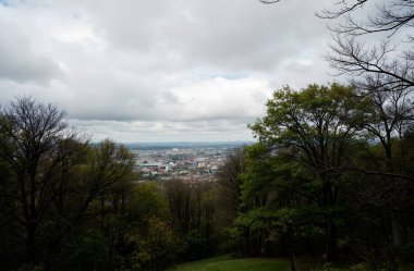 a beautiful shot of the city of lviv on a cloudy day