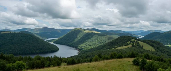 panoramic view of the mountains of the lake in the summer