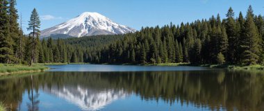 lake and mountain reflection in the water in the morning