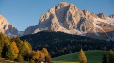 dolomites, italy, beautiful nature landscape. mountain range with trees and meadows. south tyrol