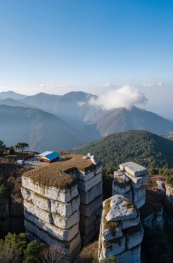 Ancient Pavilion On Rock Peak Overlooking Mountain Range
