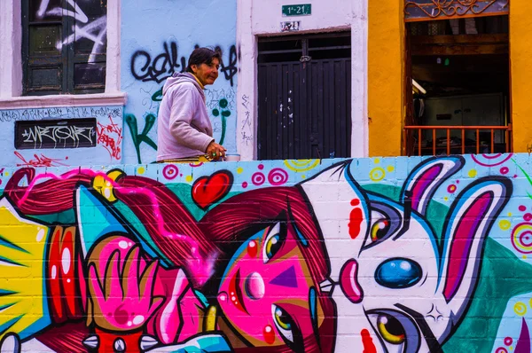 Old woman in front of princess graffiti — Stock Photo, Image