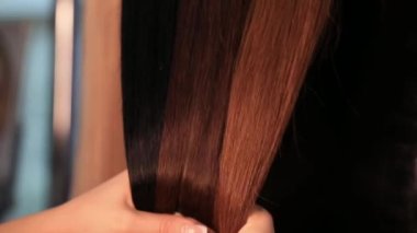 Shiny silky blonde hair extensions closeup