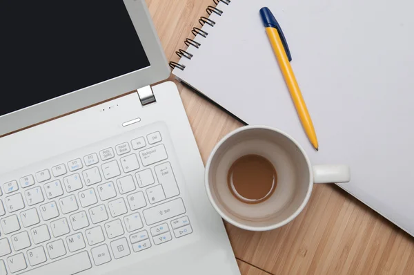 Overhead view of working at home on laptop — Stock Photo, Image