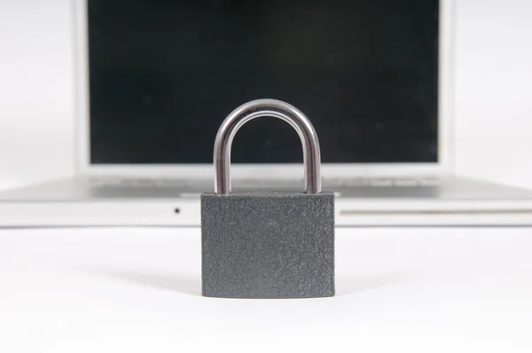 Internet security concept with padlock protecting computer from — Stock Photo, Image