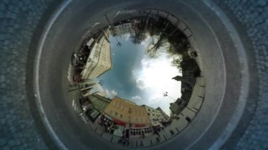 People Are Walking by Old City Street, Spherical Panorama Video, vr Video 360, Little Planet Video, Video For Sanal Reality, Parlak Sarı Ceketli Adam Kameraya Yaklaştı, Binalar
