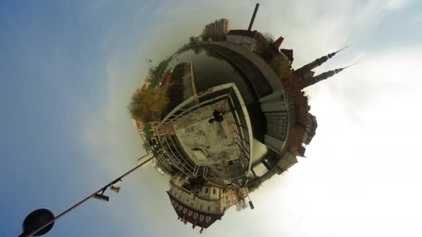 People Walking by Old City on a River Bank vr Video 360 Little Planet Video Two Towers of a Cathedral Vintage Buildings Cityscape Floating Clouds Blue Sky — Stock Video