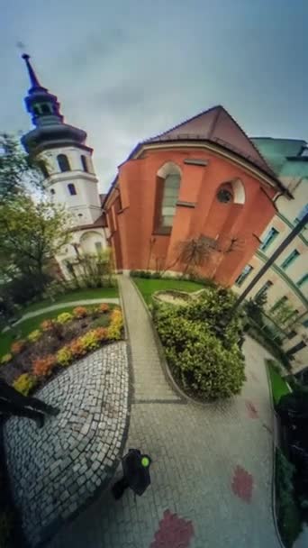 People on Paving Stones Tower Memorial Video 360 vr Panoramic View of Square Opole Poland Flowers Trees Old City Square Flower Beds Vintage Buildings — Stock Video