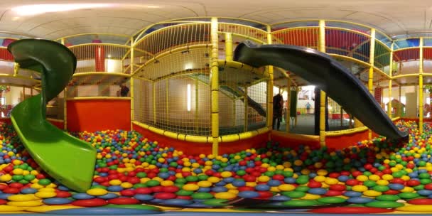 360Vr Video Play Room Chutes Colorful Balls Children's Day Opole Kids Are Runnding Behind the Net Looking at Camera Have Fun Child Development Room — Stock Video