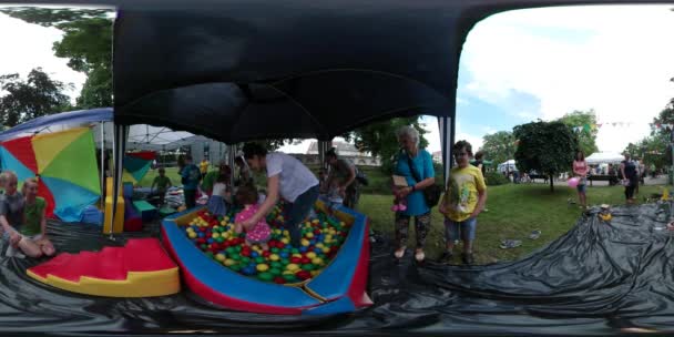 360Vr Video Kids in Pool With Balls Playground Children's Day Opole Square People Are Walking With Kids Families With Kids Spend Time Paving Stones — Stock Video