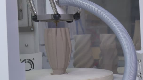 The 3D-Printer Creates the Elongated Brown Vase by Means of Polymeric Clay — Stock Video