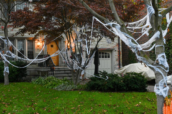 TORONTO, CANADA  29 OCTOBER 2025: Halloween decorations are put up in a residential home before the holiday