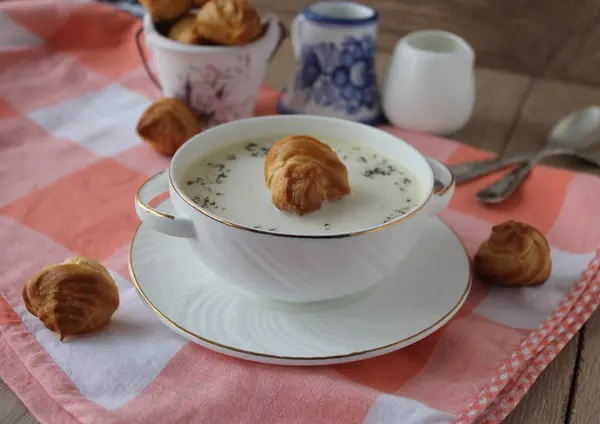 Cheese soup with profiteroles — Stock Photo, Image