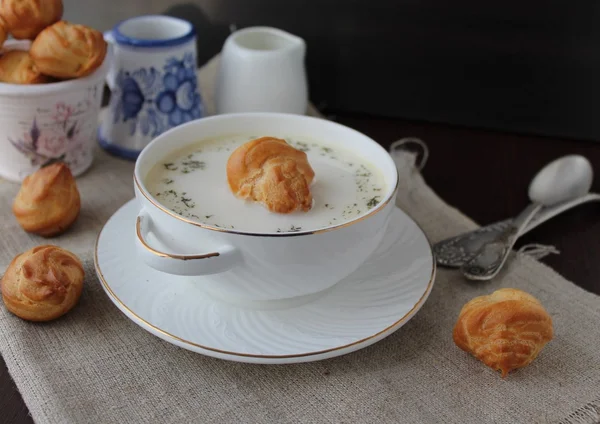 Cheese soup with profiteroles — Stock Photo, Image