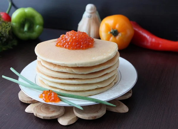 Pancakes with red caviar — Stock Photo, Image