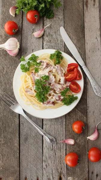 Spaghetti a La Carbonara with melted cheese — Stock Photo, Image