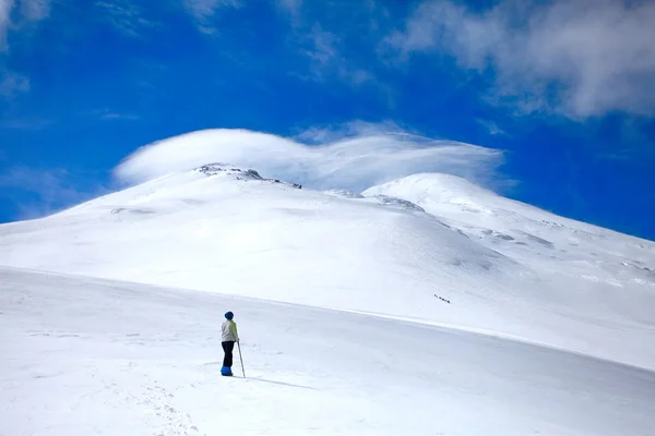 Man climbs a mountain