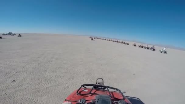 Driving the ATV in the desert. — Stock Video