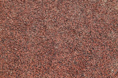 Oyun parkı döşeme dokusu, geri dönüştürülmüş plastik granüller tarafından oluşturulan ve eğitim alanlarının kurulması için uygun, açık alanlarda oynanan oyunlar. Kamu parkı için renkli elementlere sahip yapı.