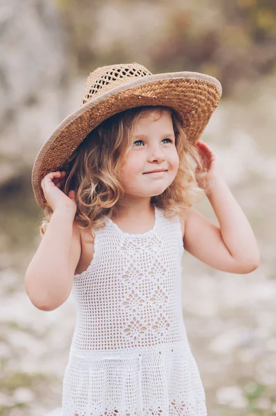 Happy little girl in hat — Stock Photo, Image