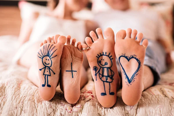 Close up of feet with drawings — Stock Photo, Image