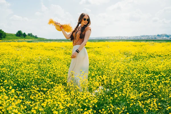 Romantic hippie girl on a field — Stock Photo, Image