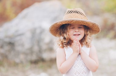 happy little girl in hat clipart