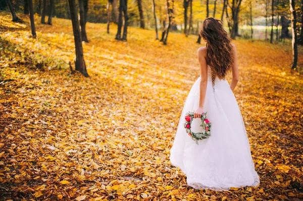 Happy bride in forest — Stock Photo, Image