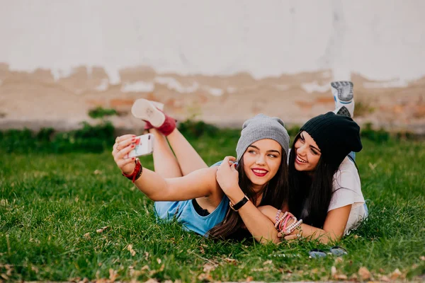 Beautiful brunette girls having fun — Stock Photo, Image