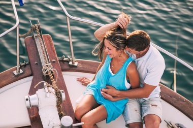 Couple relaxing on the yacht cruise