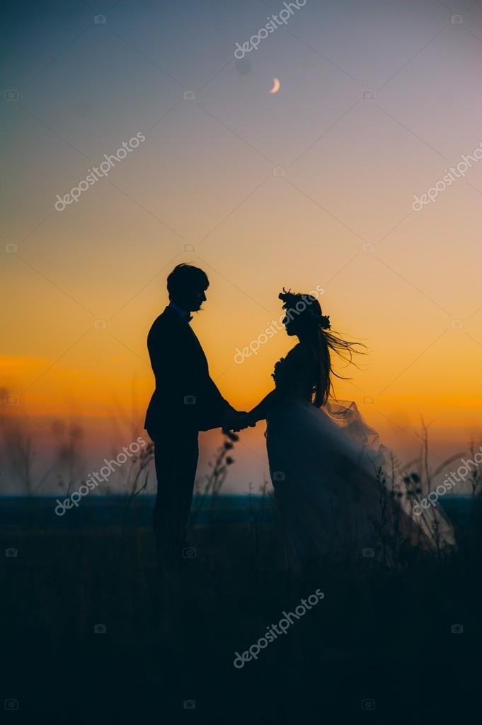 Silhouette Of Couple With Sunset Stock Photo Photolife