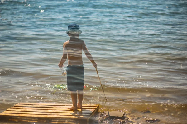 Un niño en la pesca sombrero —  Fotos de Stock