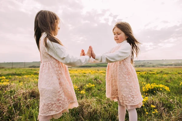 Cute twin sisters — Stock Photo, Image