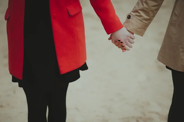 Girls holding hands — Stock Photo, Image