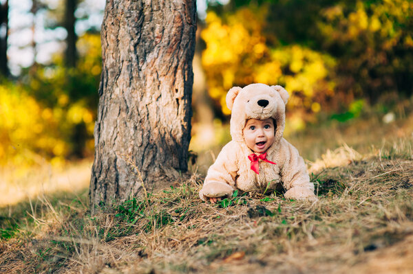 child dressed as a bear