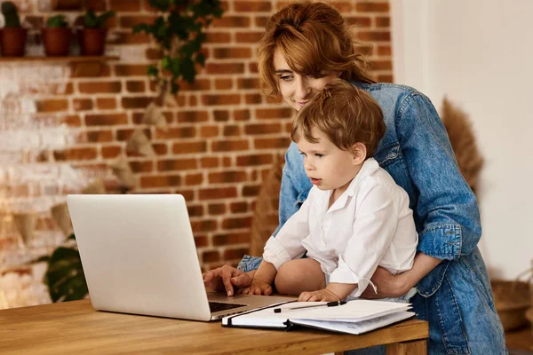 Mom works at the computer