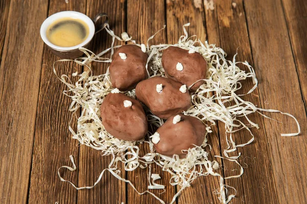 Cake potatoes. Tasty cakes on a wooden table